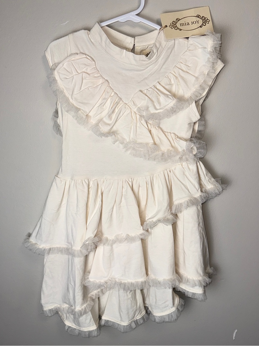 Joyfolie Cream Ruffle Tier Dress with Ribbon Charm